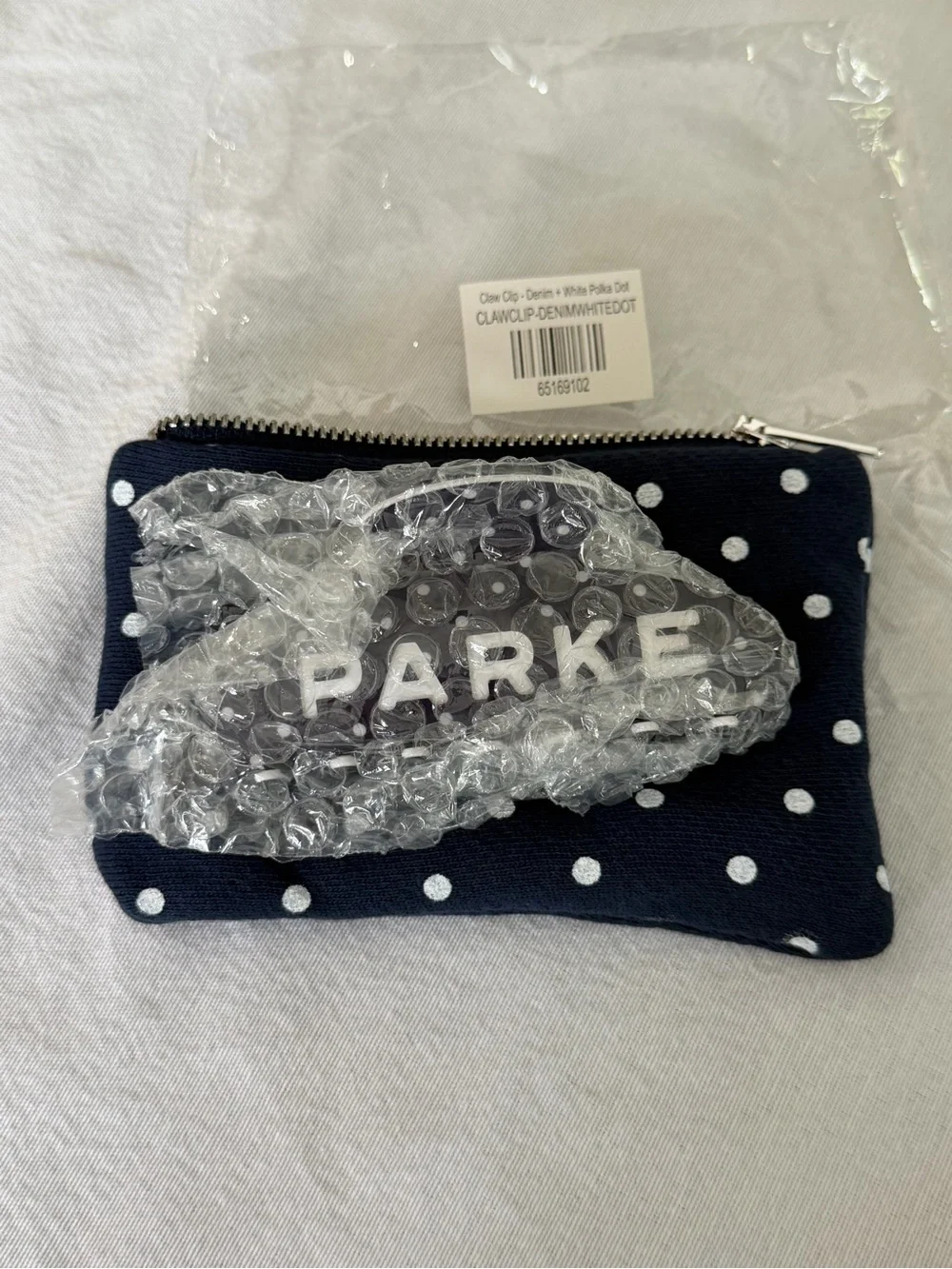 Parke Navy and White Polka Dot Clip with Pouch